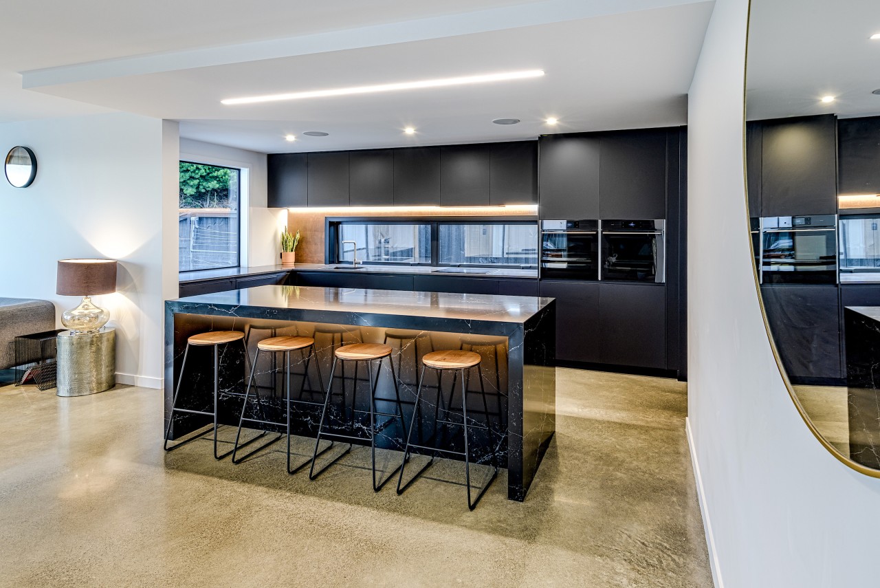 For this project, the homeowners wanted a matt apartment, architecture, building, cabinetry, ceiling, countertop, design, dining room, floor, flooring, furniture, home, house, interior design, kitchen, living room, property, real estate, room, table, gray