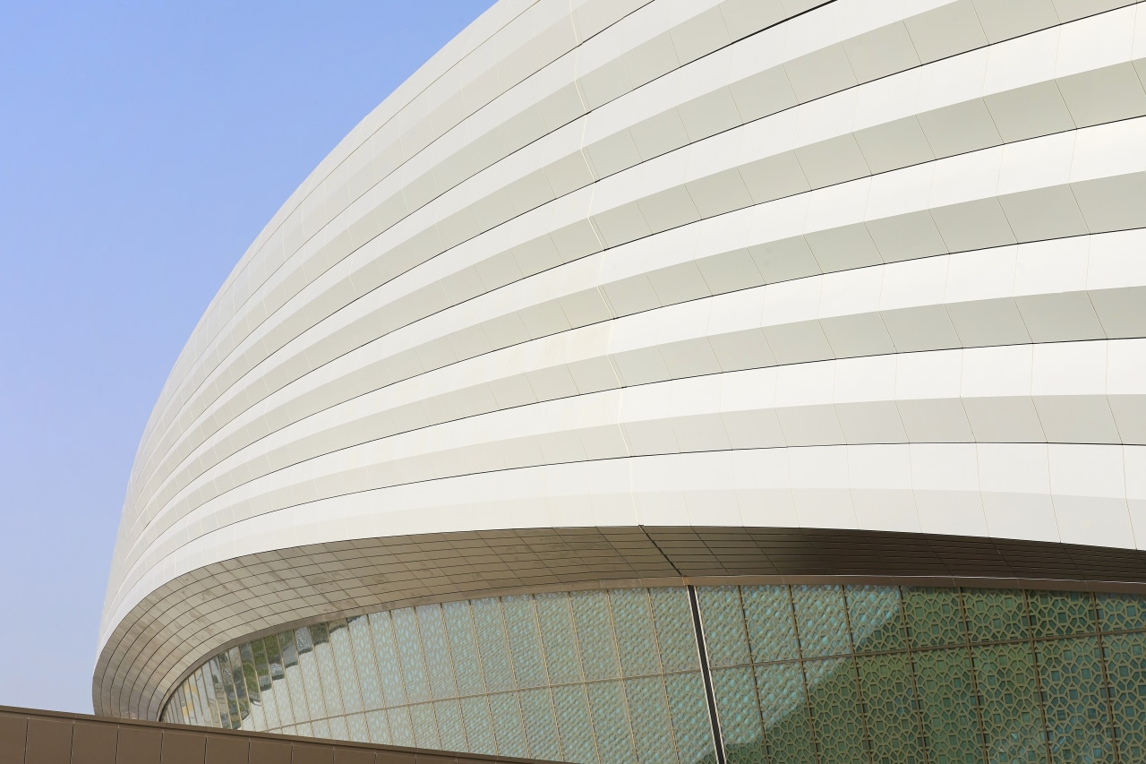 The external cladding materials are from a limited architecture, building, daylighting, daytime, facade, house, line, material property, reinforced concrete, sky, white