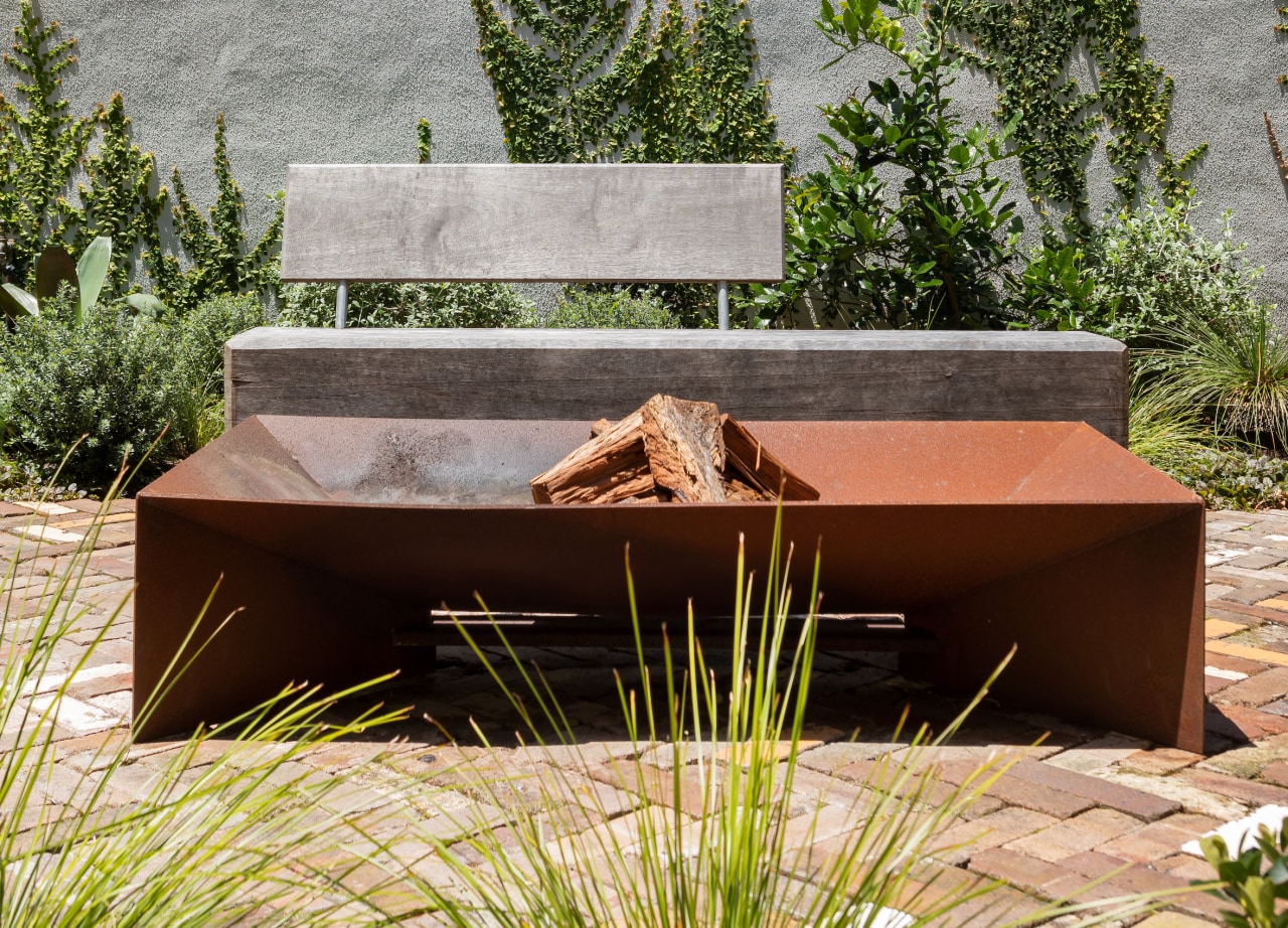 Beyond the home is a low-maintenance garden with 