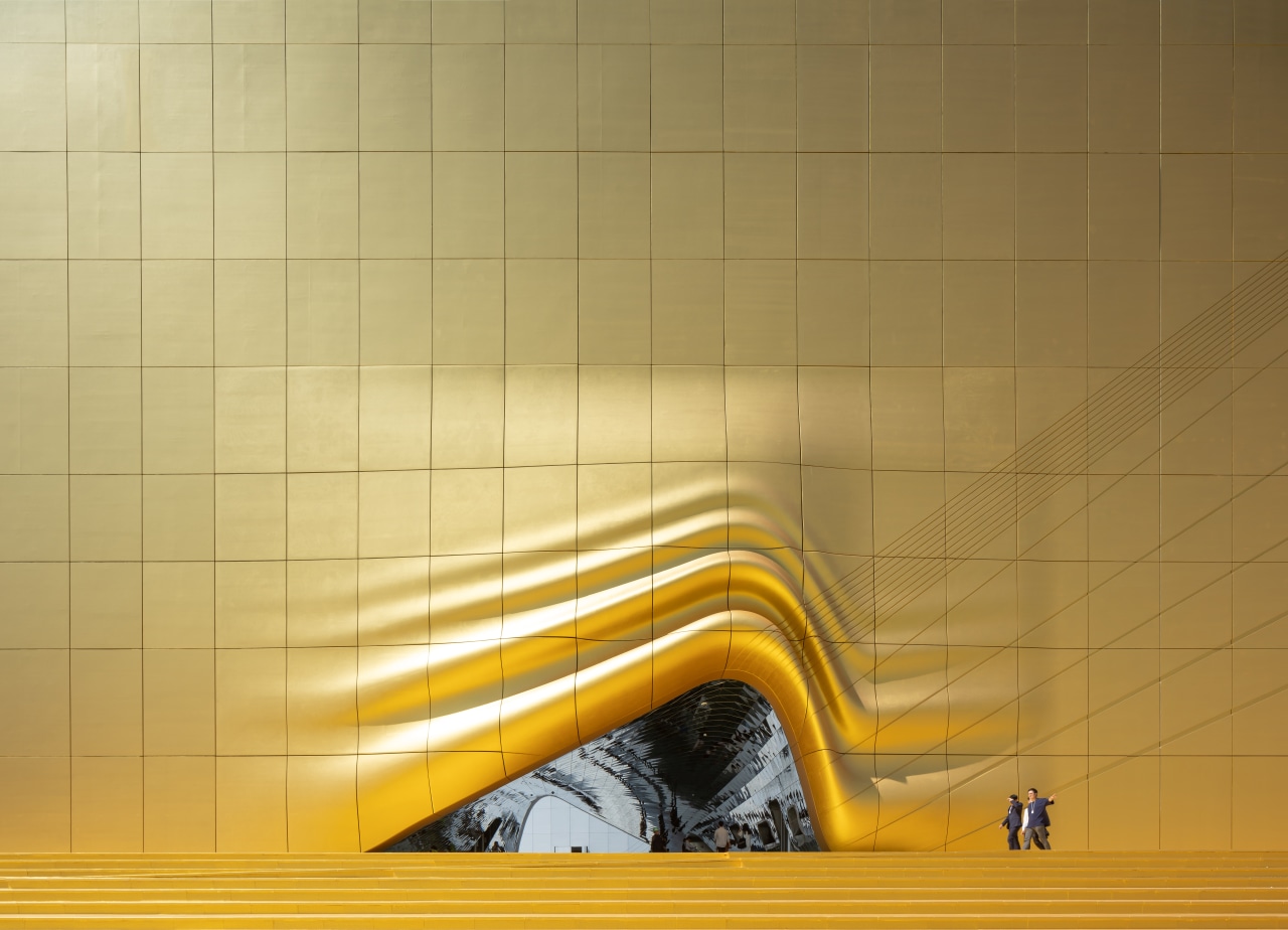 A splash of gold at the entrance to angle, ceiling, floor, flooring, line, tile, wall, yellow, orange, brown