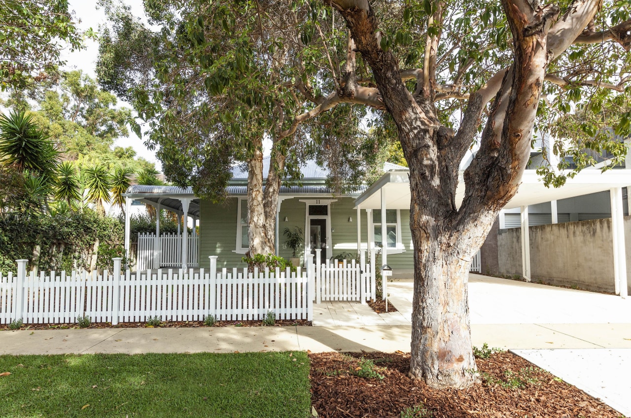 An existing high front fence was replaced with 