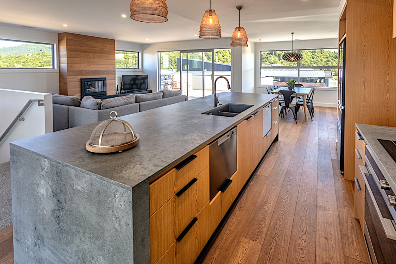 Warm, rich timber flooring and cabinetry provides vivid architecture, building, cabinetry, ceiling, countertop, floor, flooring, furniture, granite, hardwood, home, house, interior design, kitchen, plywood, property, real estate, room, tile, wood, wood flooring, wood stain, gray