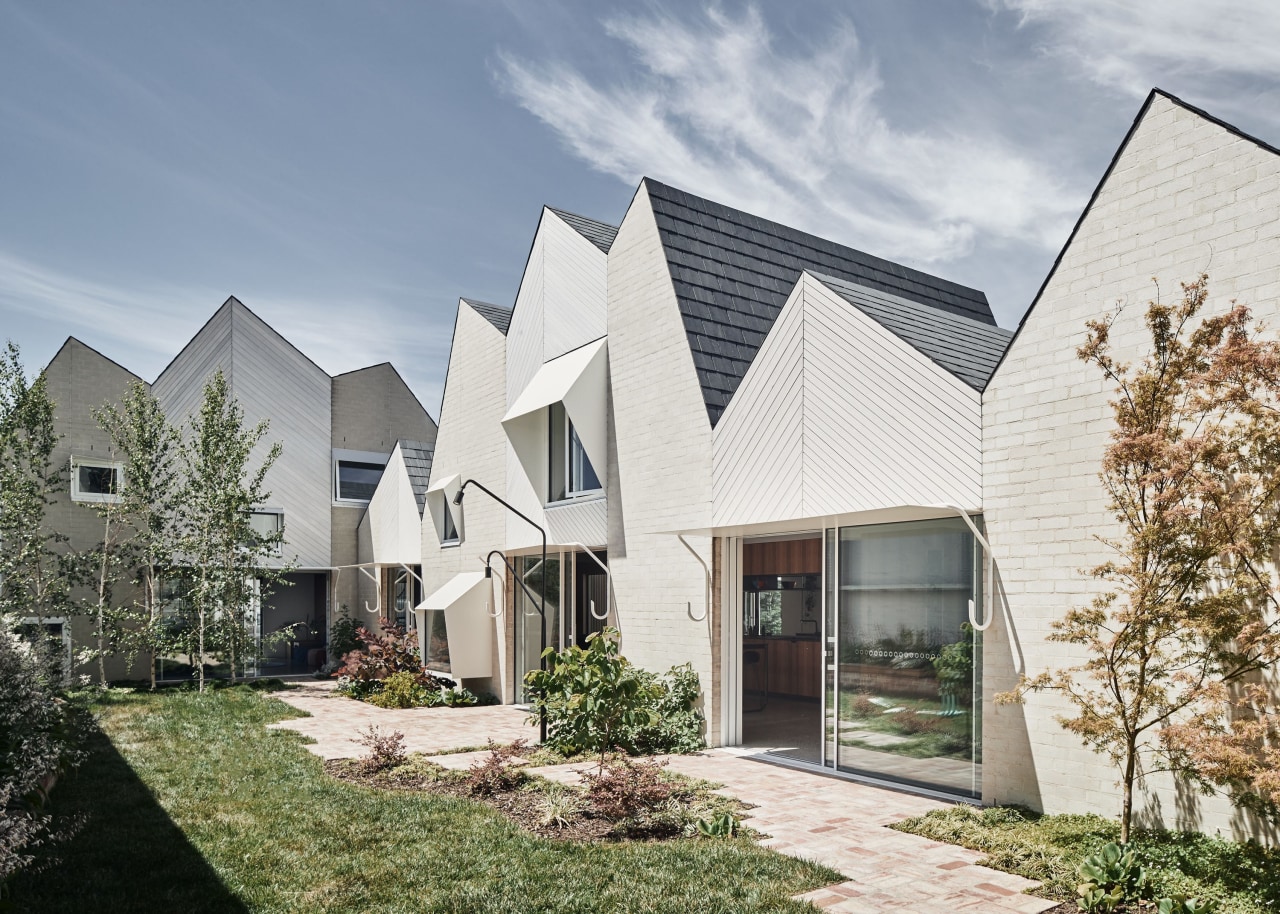 RaeRae's mountain roof form is shaped through context gray, white