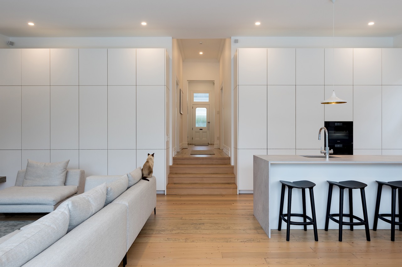 Divided interests – ancillary/cleaning/AV storage to the left, gray