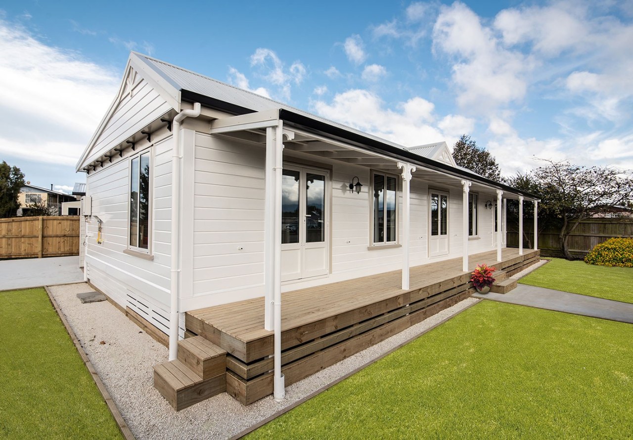 Niagaras Rusticated Weatherboards On Moveable David Wraight House cottage, facade, home, house, property, real estate, siding, white