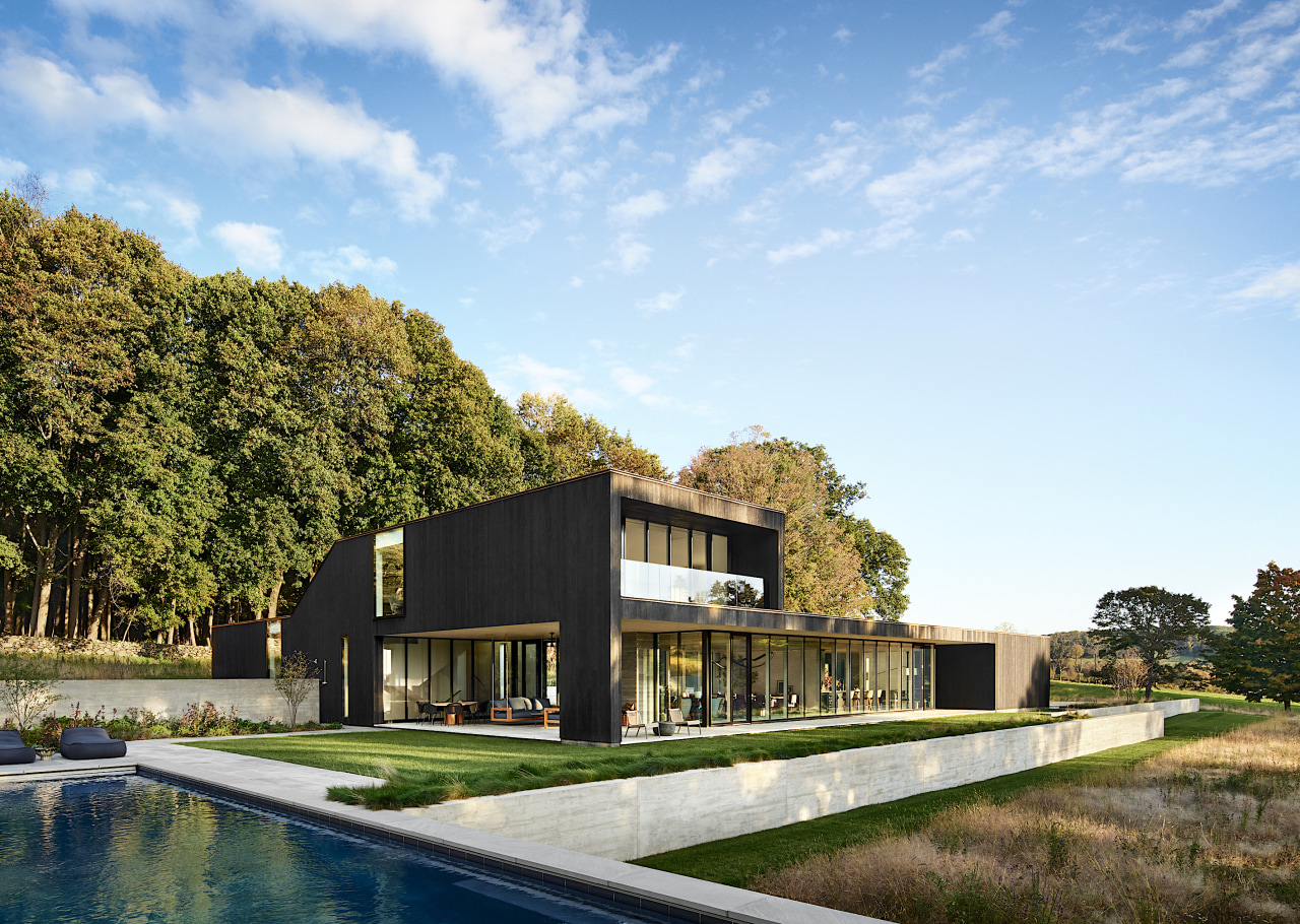 Pool with the central, sun-drenched living pavilion behind 