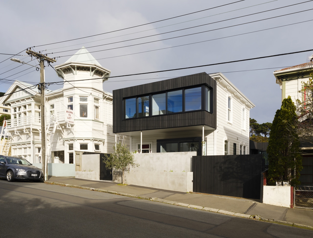 Street view of the expanded home. - Respectful 