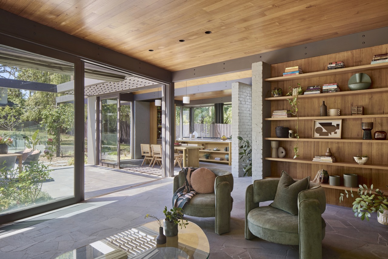 Natural wood finishes predominate even to the living 
