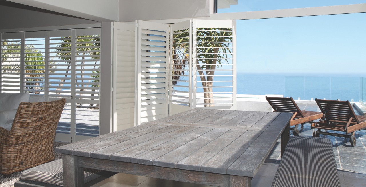 Shutters add filtered light and a relaxed Mediterranean 