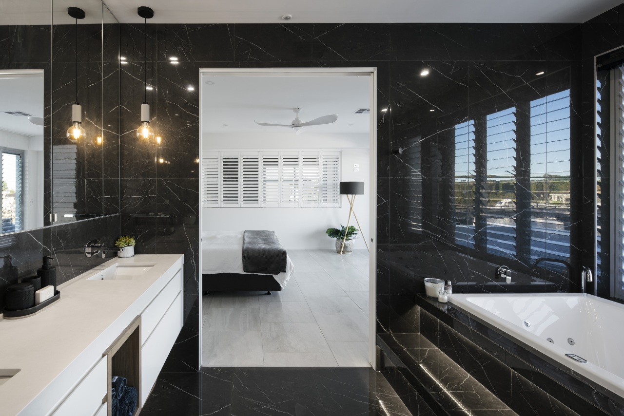 The black-and-white bathroom complements the adjacent master bedroom. apartment, architecture, bathroom, black-and-white, building, ceiling, countertop, design, floor, flooring, furniture, glass, home, house, interior design, loft, property, real estate, room, tile, black, gray