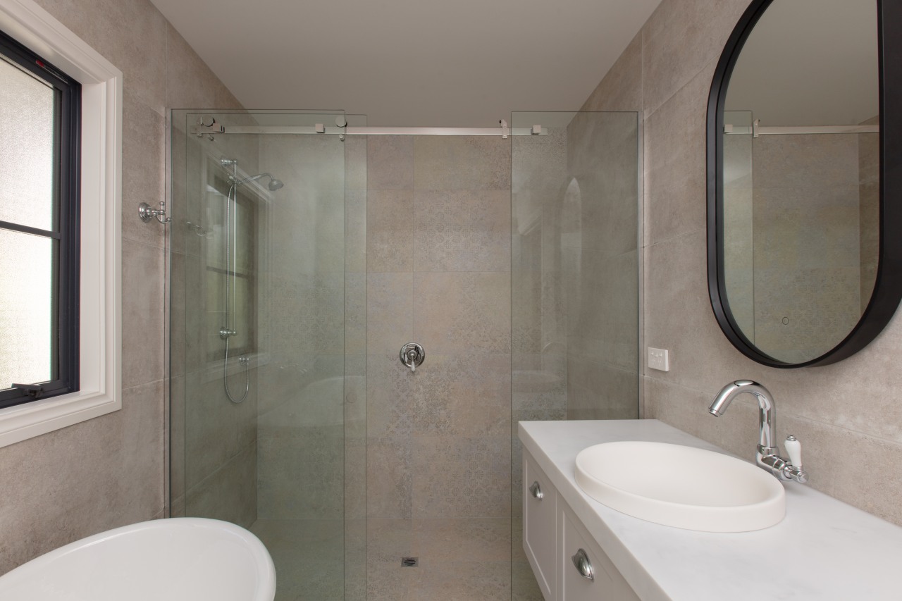 In both the bathroom and ensuite, Blanc Heritage 