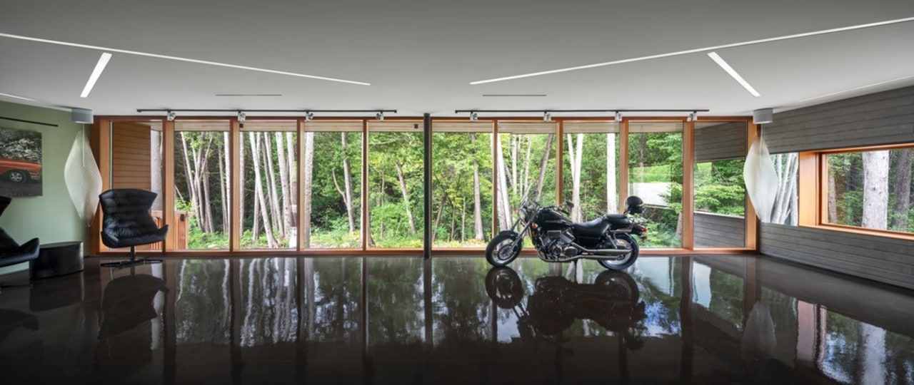 The garage – yes it's a garage – architecture, building, ceiling, home, house, interior design, property, real estate, room, shade, vehicle, wall, window, gray, black