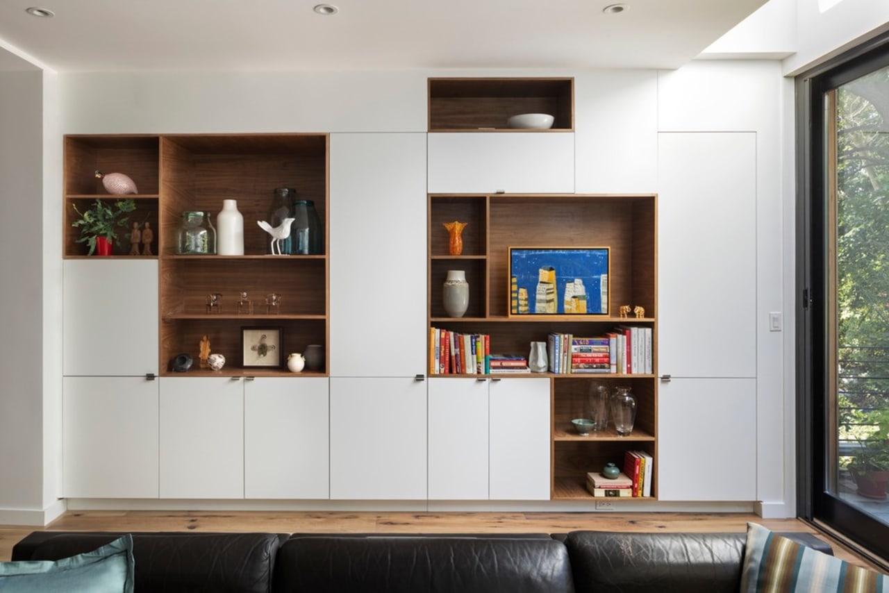 Start slow with the decluttering process – like architecture, bookcase, building, cabinetry, ceiling, couch, floor, furniture, home, house, interior design, living room, room, shelf, shelving, table, wall, wood, white