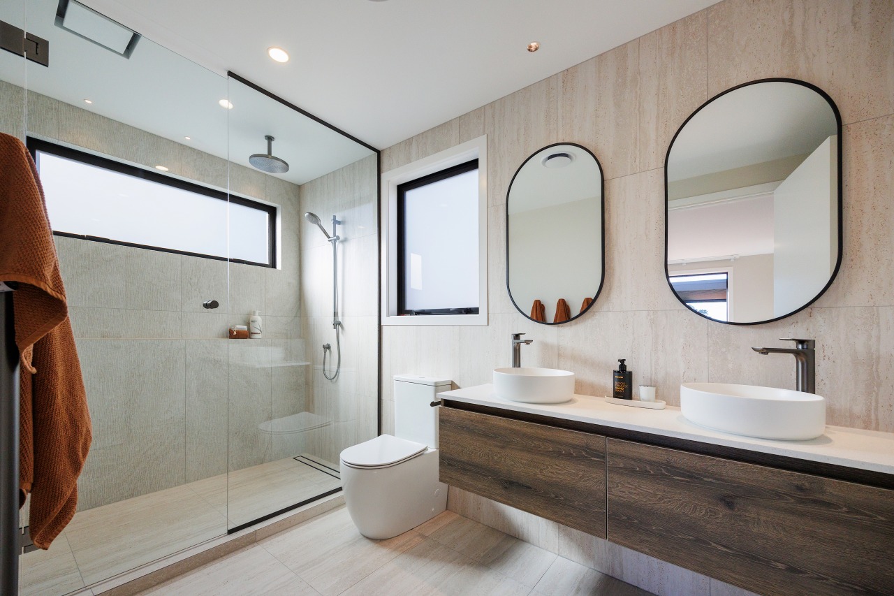 Considered tile choices, both in a neutral colour 