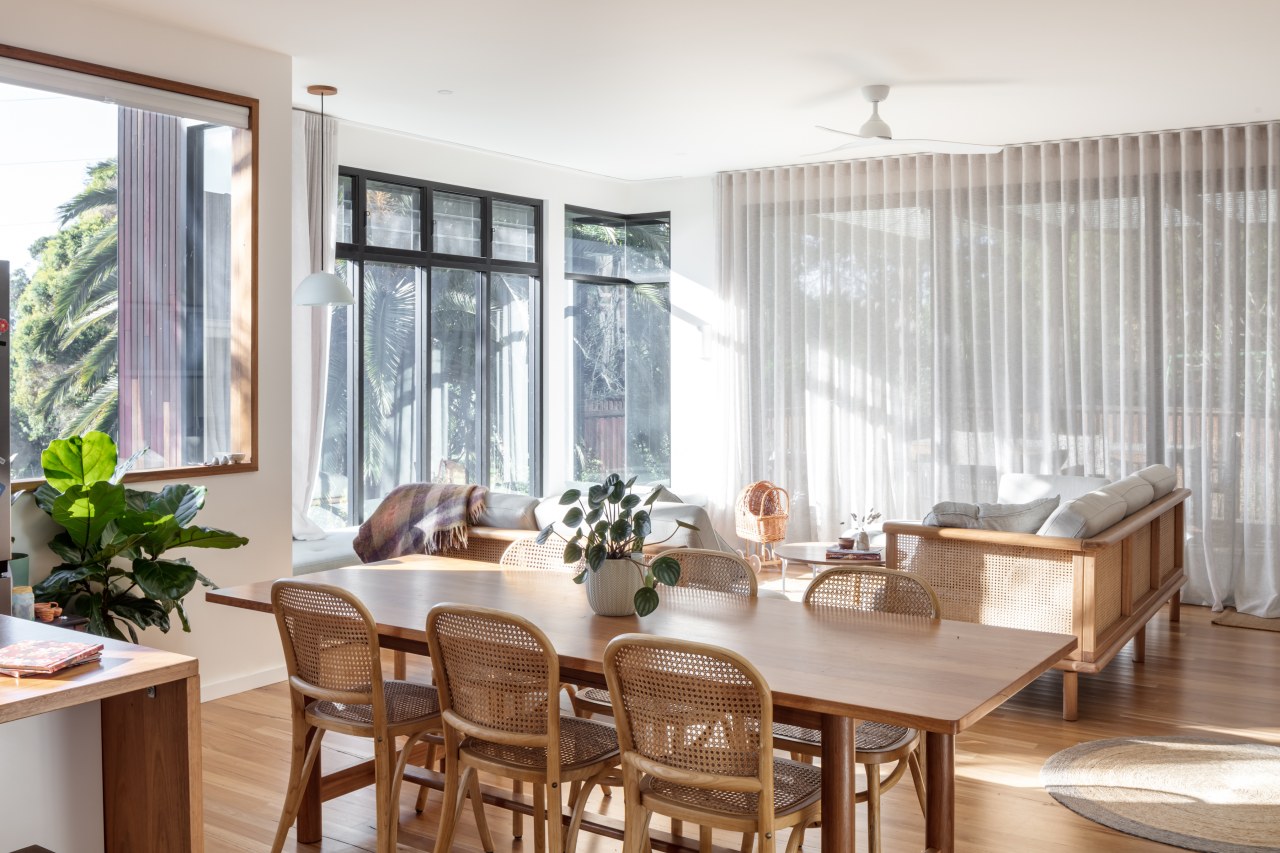 Kitchen to dining to living to rear deck 