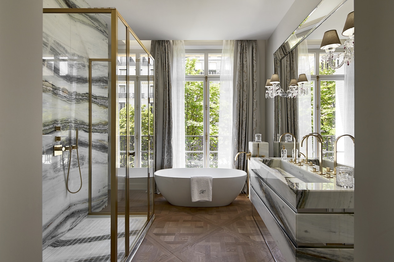 This bathroom needs non-slip floors, dripping in sheer gray