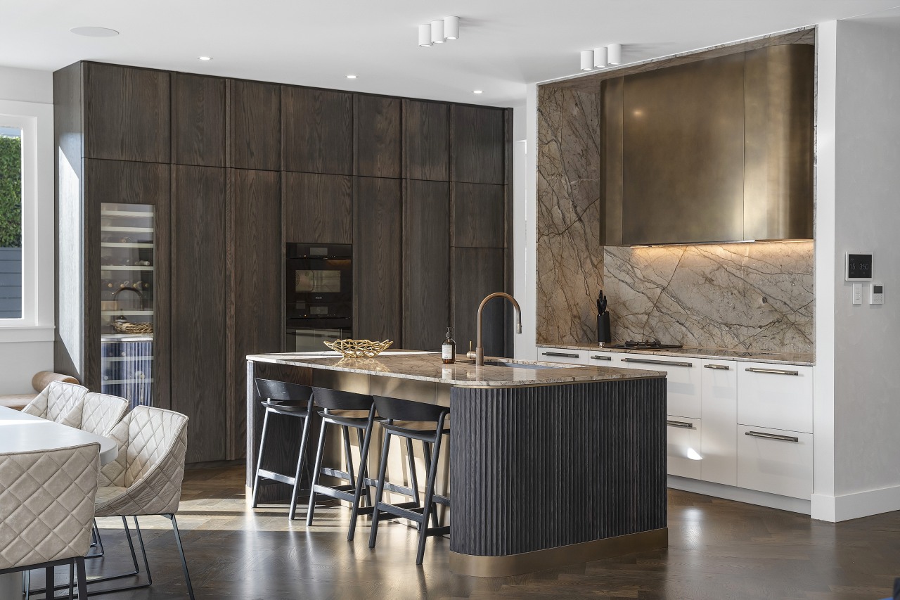 A rich, sumptuous palette includes chocolate cabinetry, aged 