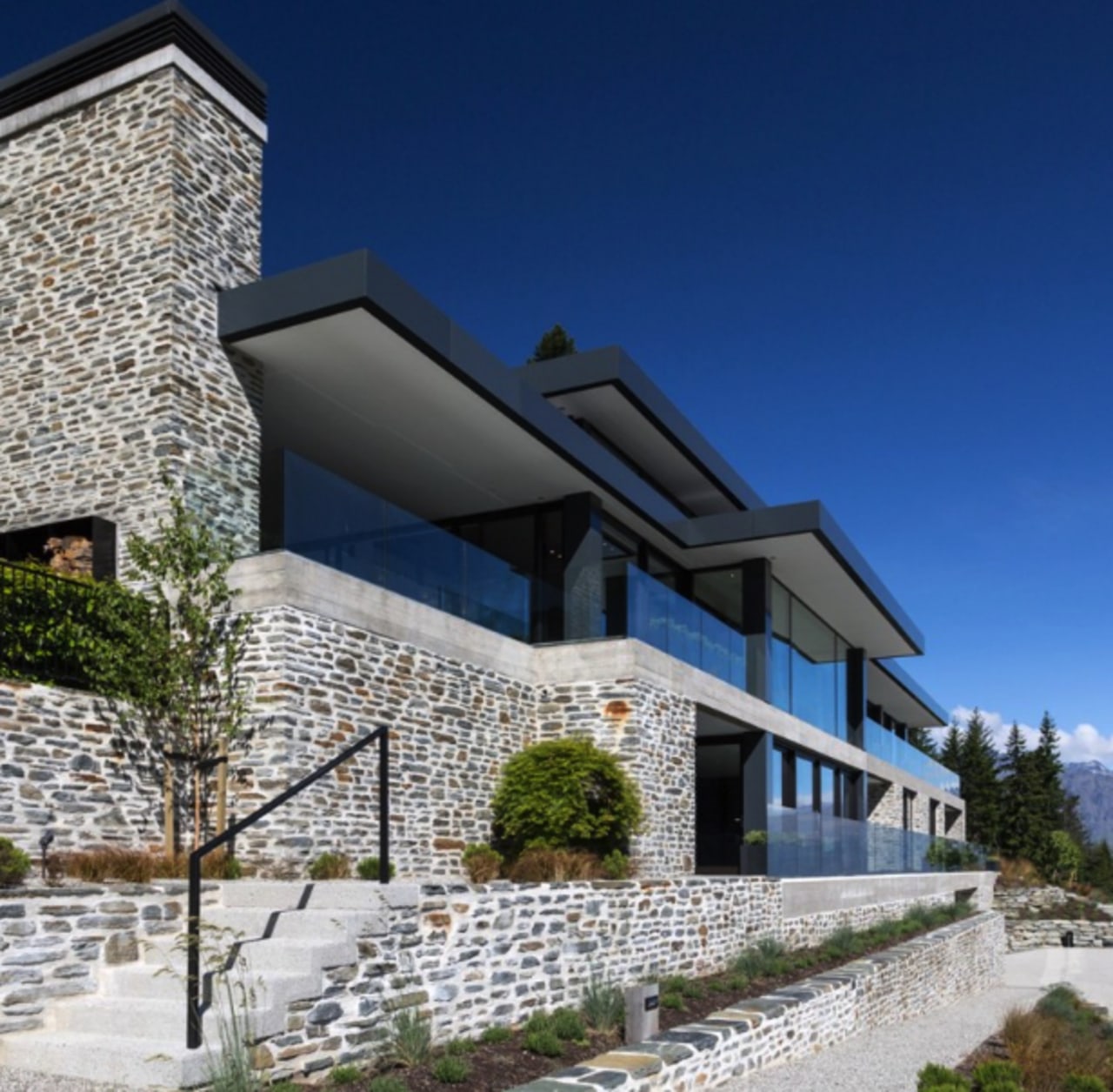 The home's top floor is effectively a glass-fronted 