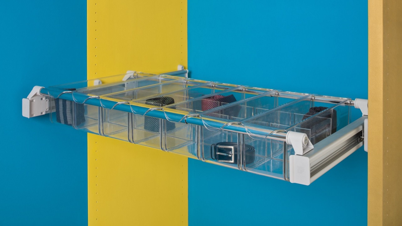 Ambos pull out drawers are clear, making it glass, plastic, product, teal