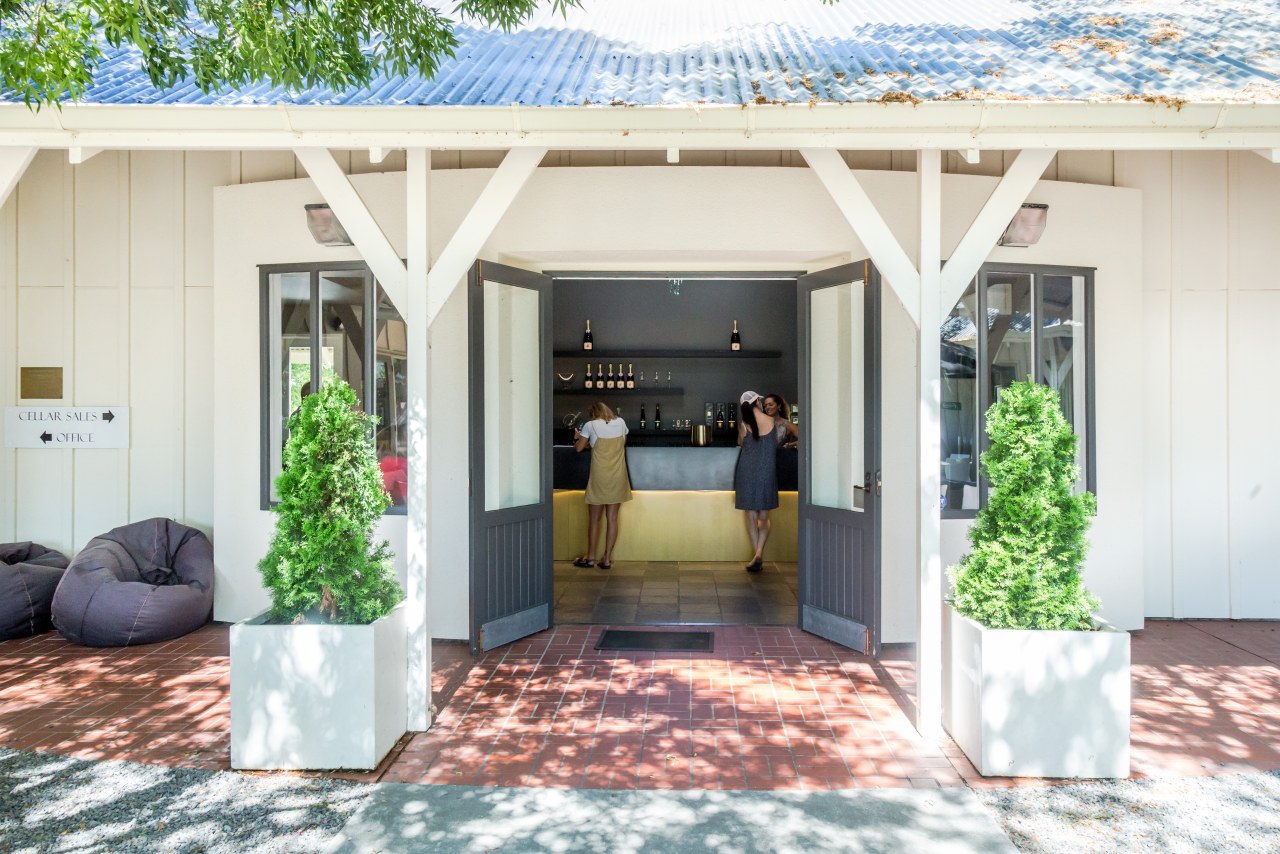 Winner – Palliser Estate Winery Tasting Room by backyard, building, cottage, courtyard, door, estate, facade, home, house, patio, property, real estate, roof, room, shed, white