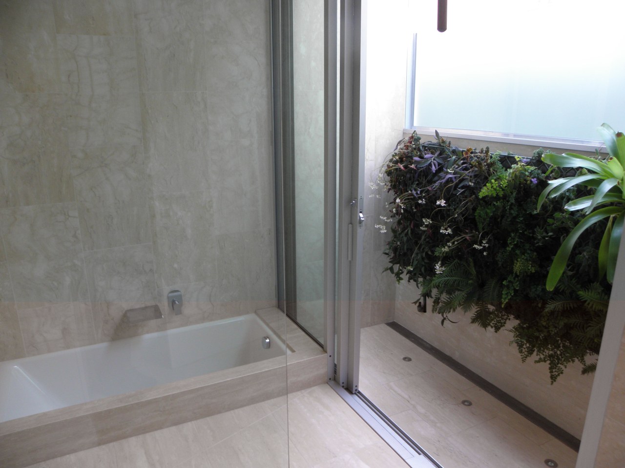 Greenwalls in the bathroom are low maintenance area, bathroom, glass, home, property, real estate, room, window, gray