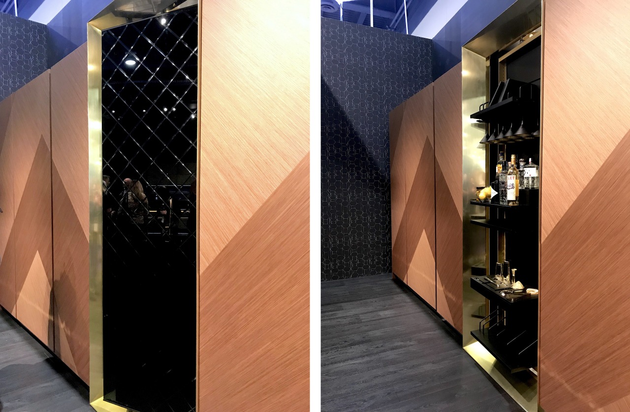 This large framed quilted textured glass spins  around black, orange