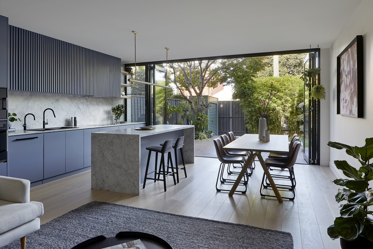 The generous kitchen benchtop and island, finished in 