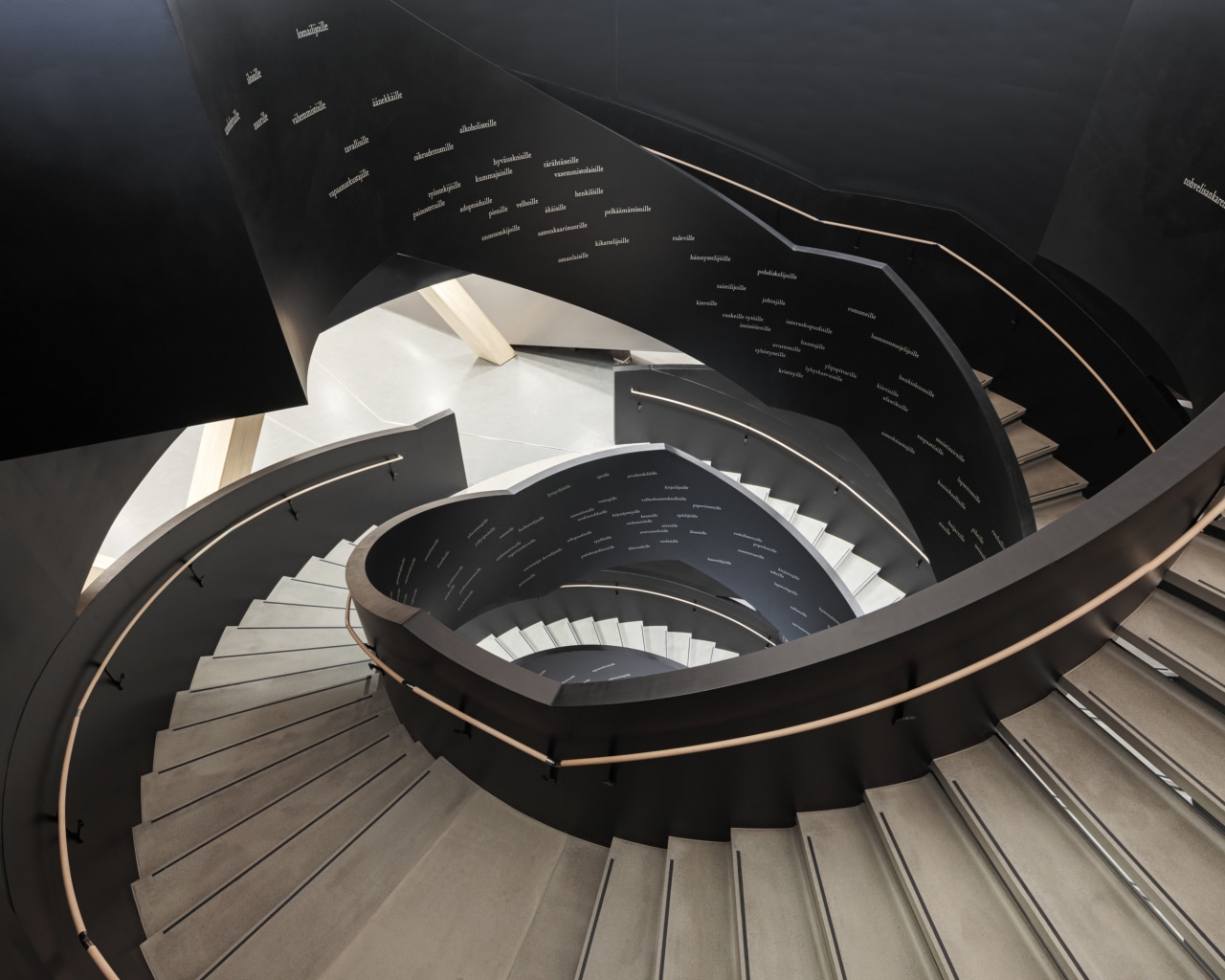 For the Helsinki library, the complex curved geometry architecture, automotive design, font, material property, stairs, black, gray