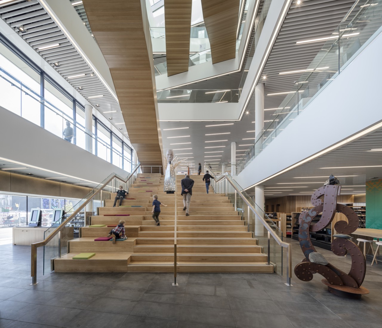 Christchurch Central Library – the open, inviting entrance airport terminal, architecture, building, ceiling, daylighting, interior design, lobby, metropolitan area, mixed use, shopping mall, structure, gray, white