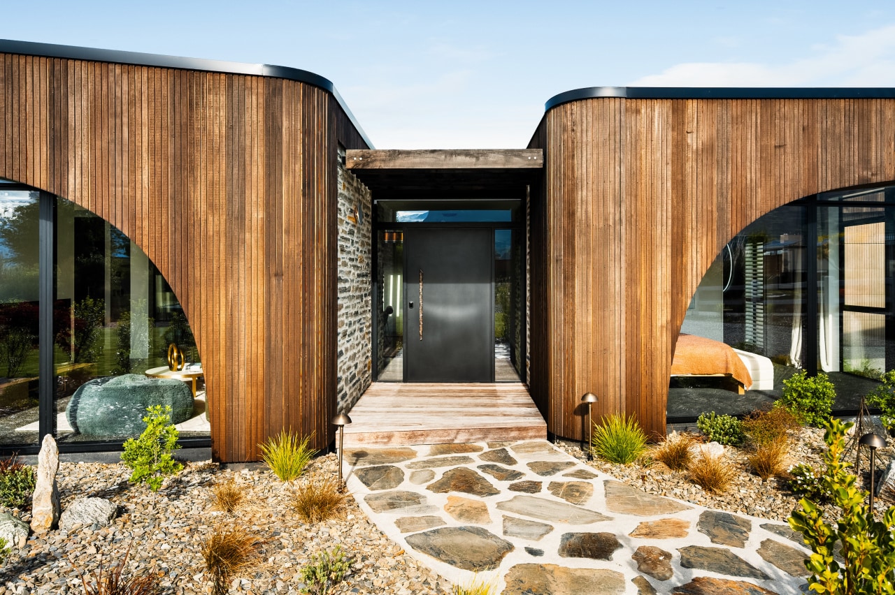 Inspired by a diving whale’s tail, the home 