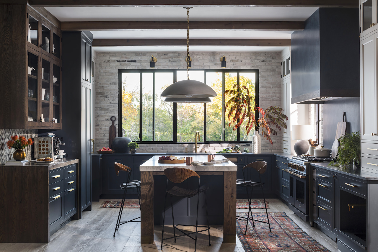 Rich blue/ black cabinetry was chosen to contrast 