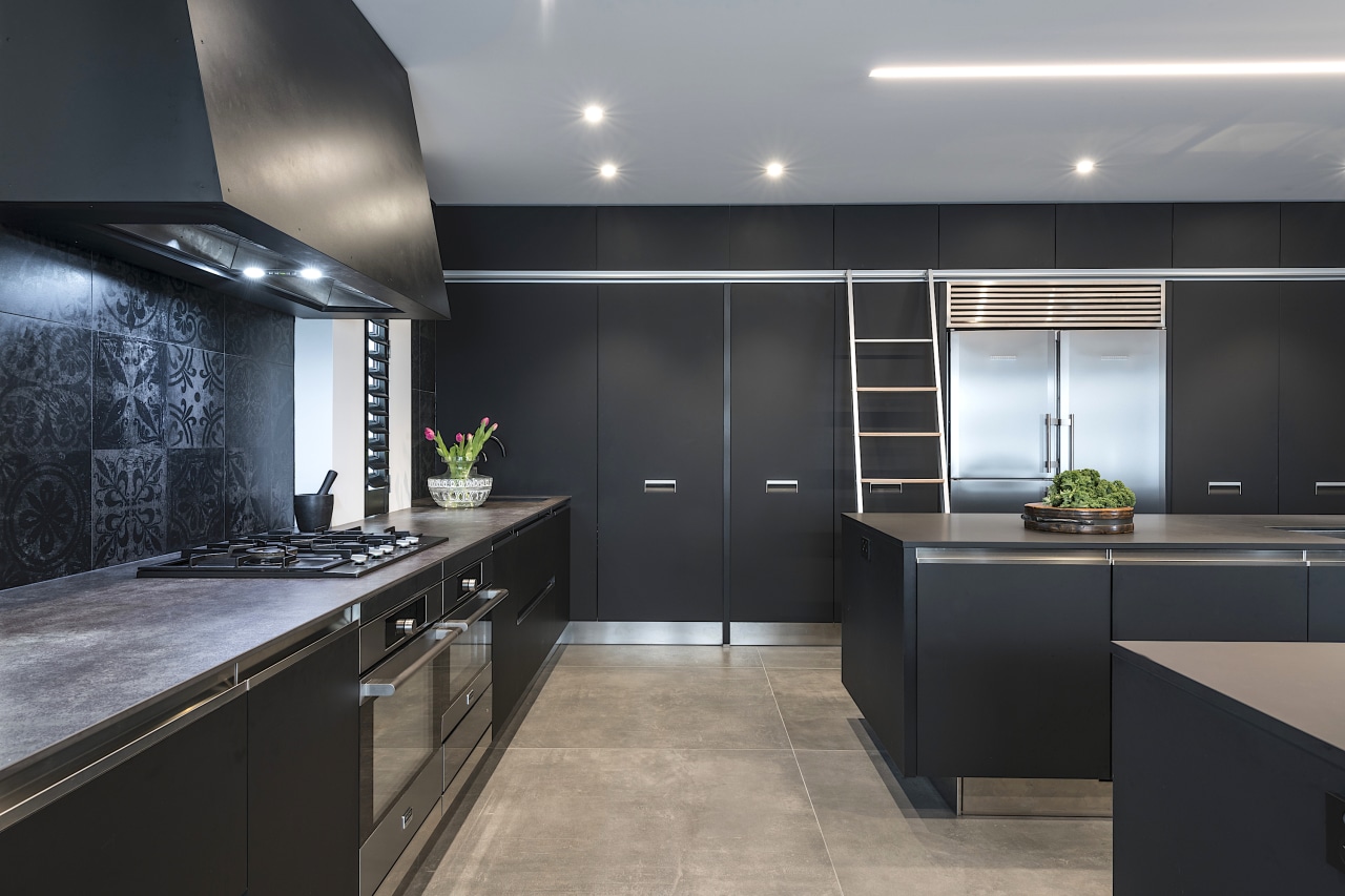 Tall order? Capacious storage climbs to the ceiling black, gray