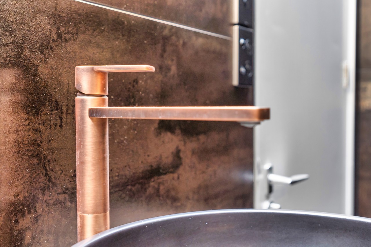 Copper tapware was chosen to complement the tilework. 