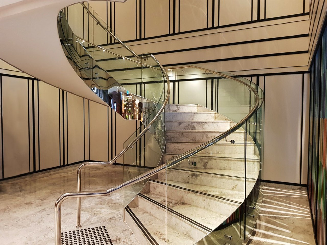 Doubletree Hilton 1 - architecture | baluster | architecture, baluster, building, ceiling, daylighting, glass, handrail, interior design, iron, material property, metal, stairs, orange, brown