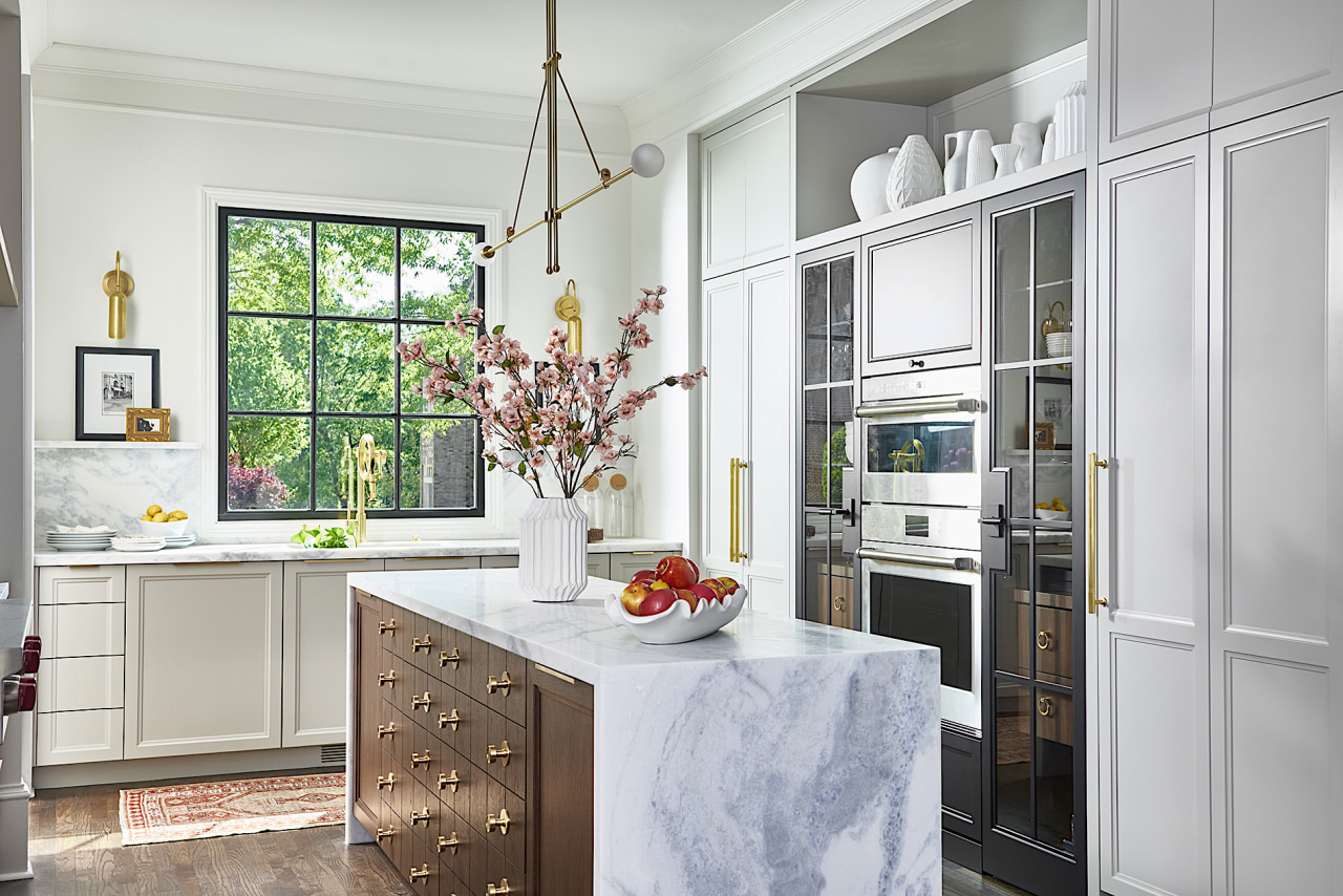 Panelled cabinetry adds to the traditional vibe. 