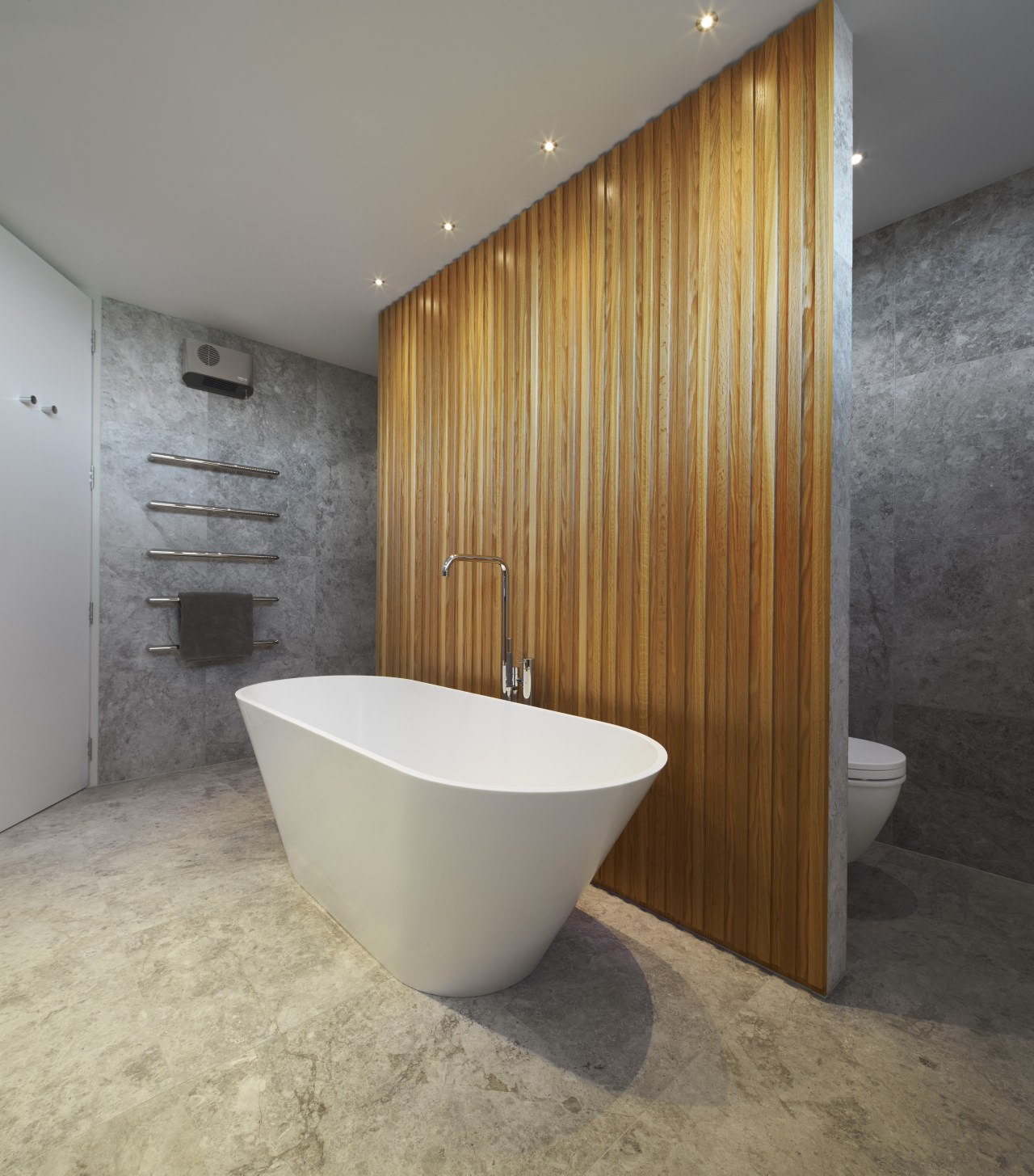 Lighter tones that blend seamlessly from the walls bathroom, floor, interior design, plumbing fixture, tile, gray