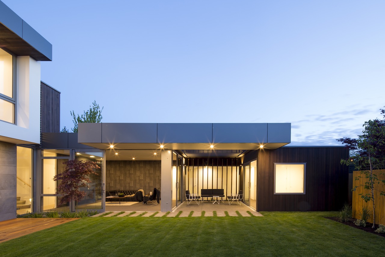 The outdoor room separates the home's fourth bedroom 