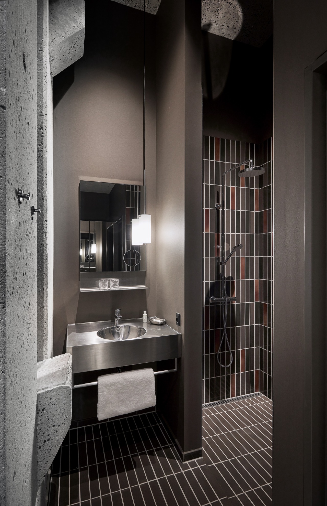 Concrete, tile and steel are combined to create architecture, bathroom, black, black-and-white, building, ceiling, floor, flooring, furniture, home, house, interior design, property, room, tile, black, gray