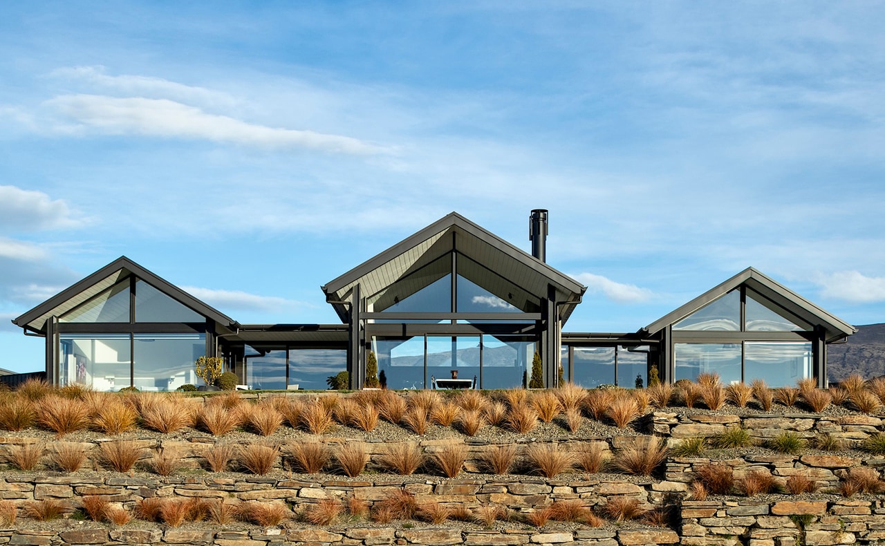 Staggered landscaping steps the house into its rugged 