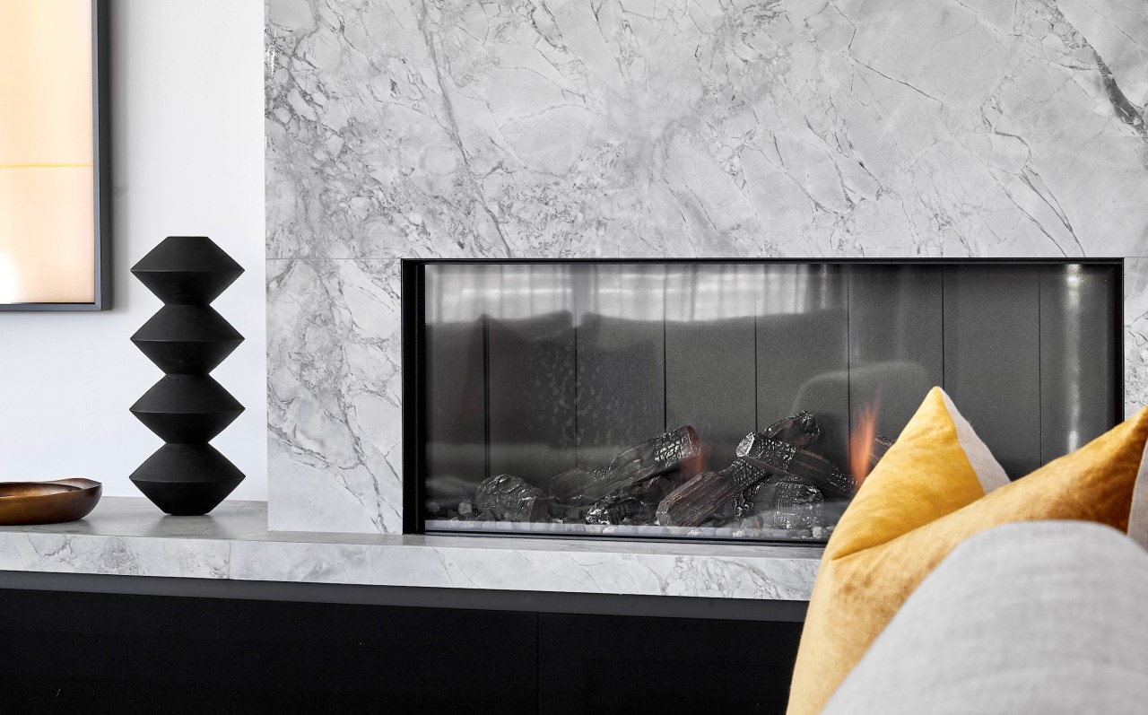 New fireplace with feature stone surround. - Sense