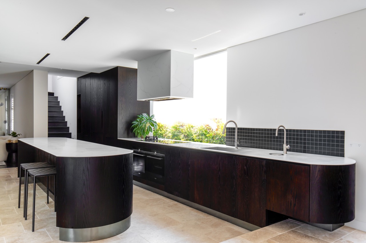 The kitchen benefits from individualistic details and materials 