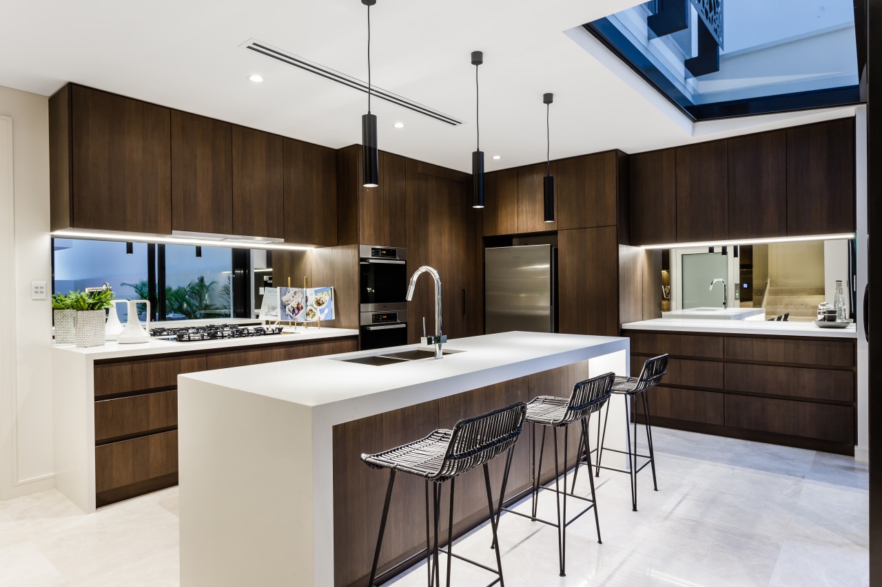 Mirror splashbacks add to the sense of space cabinetry, countertop, cuisine classique, interior design, kitchen, white, black