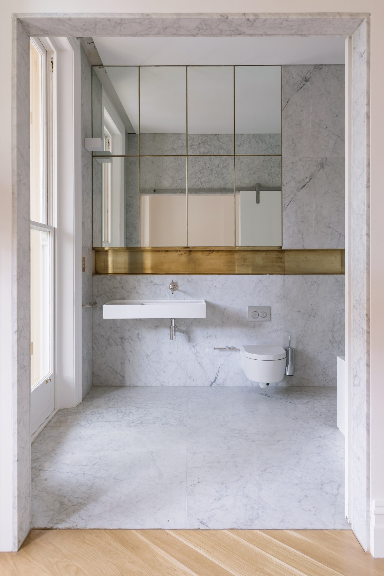 ​​​​​​​In this bathroom, a classic room-high sash window architecture, bathroom, bathroom accessory, bathroom cabinet, floor, interior design, sink, gray