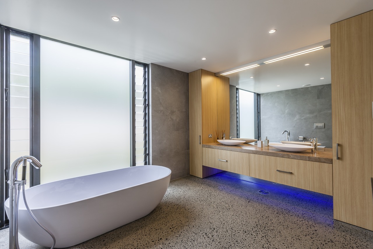 Atmospheric lighting and a freestanding tub accompany bespoke architecture, bathroom, room, gray, white, bespoke cabinetry, custom, RH Cabinetmakers, Storeage