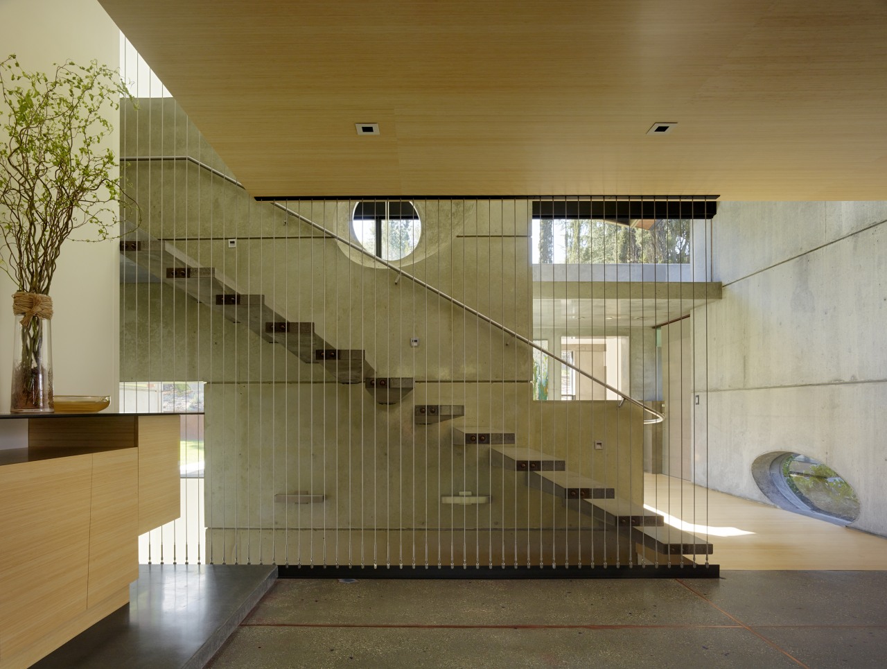 ​​​​​​​Just inside the entrance to this home, the architecture, balustrade, stairway, glass, handrail, house, interior design, FuTung Cheng, Cheng Design