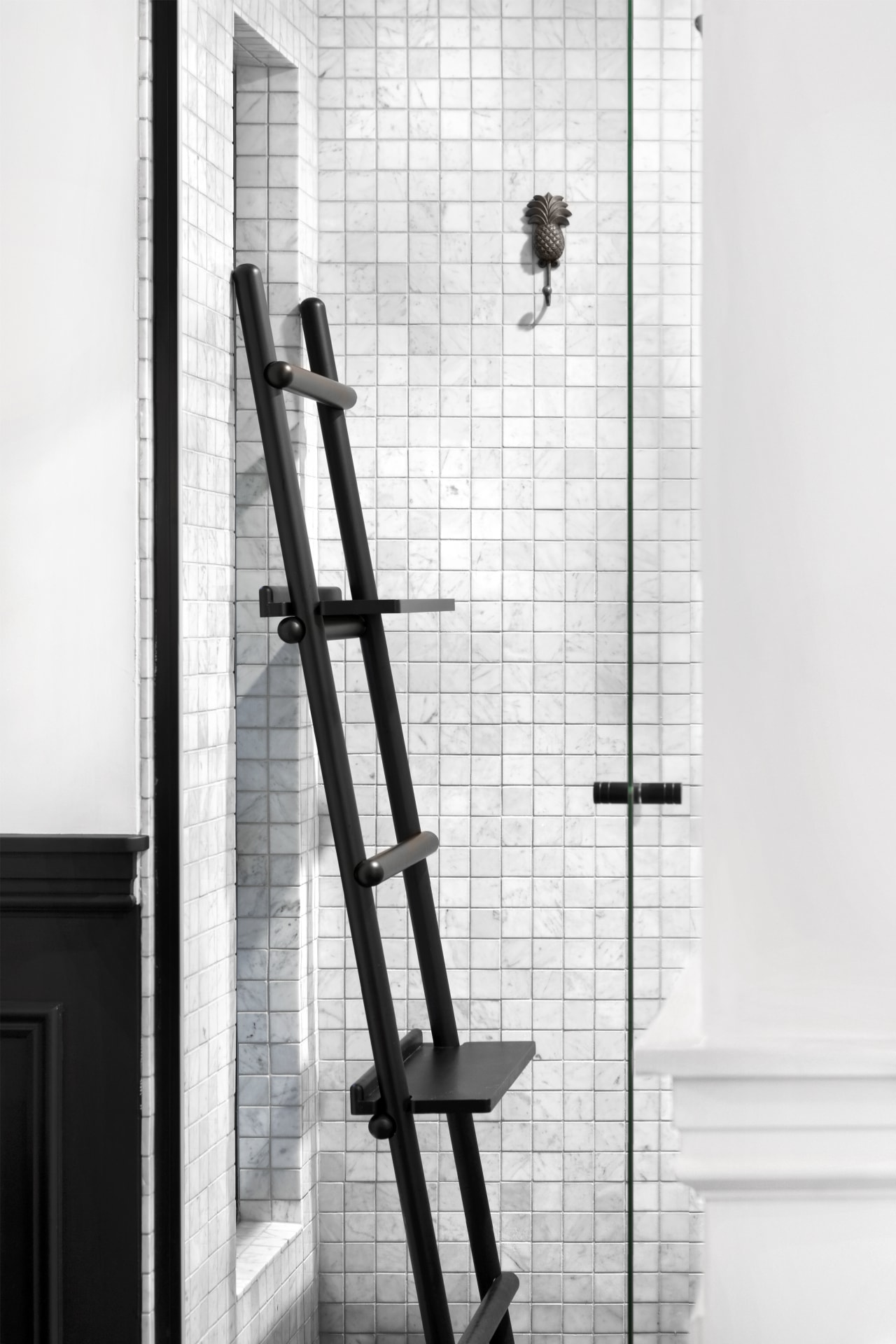 This quirky shower stall inclusion has a ‘found’ black and white, ladder, structure, window, white