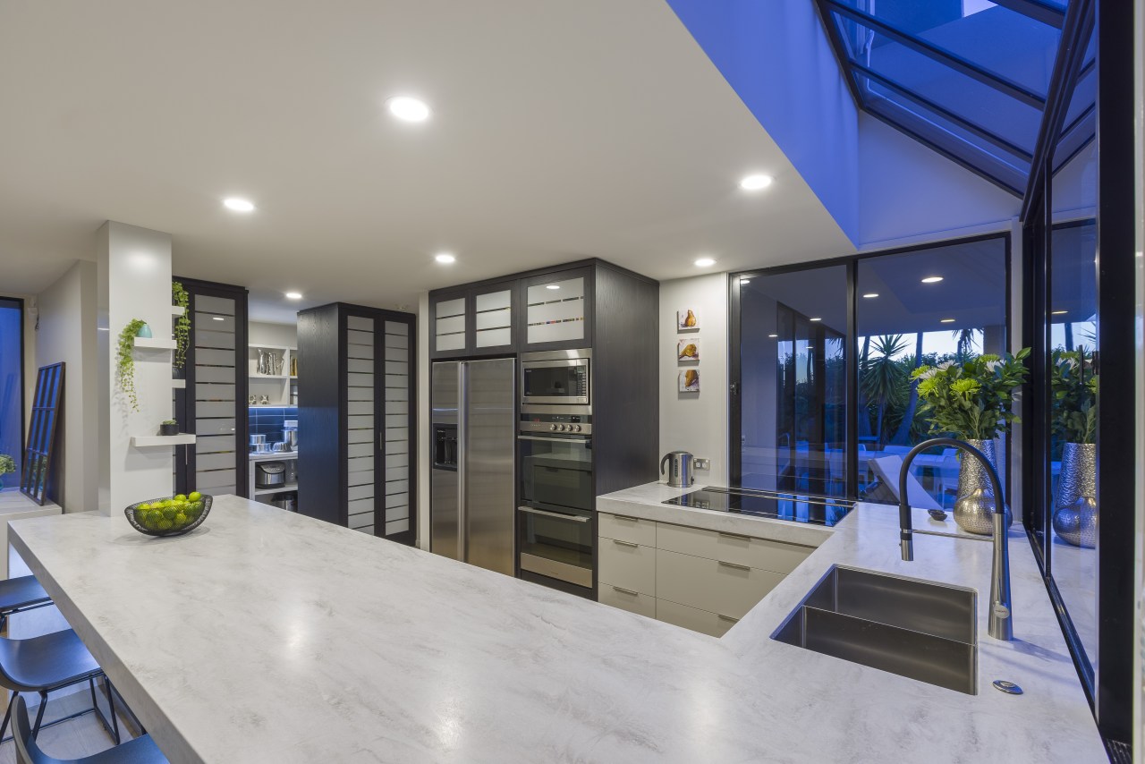 Two pantries for food and crockery flank the house, home, kitchen design, Kira Gray, Fyfe Kitchens, cabinetry, Corian benchtop
