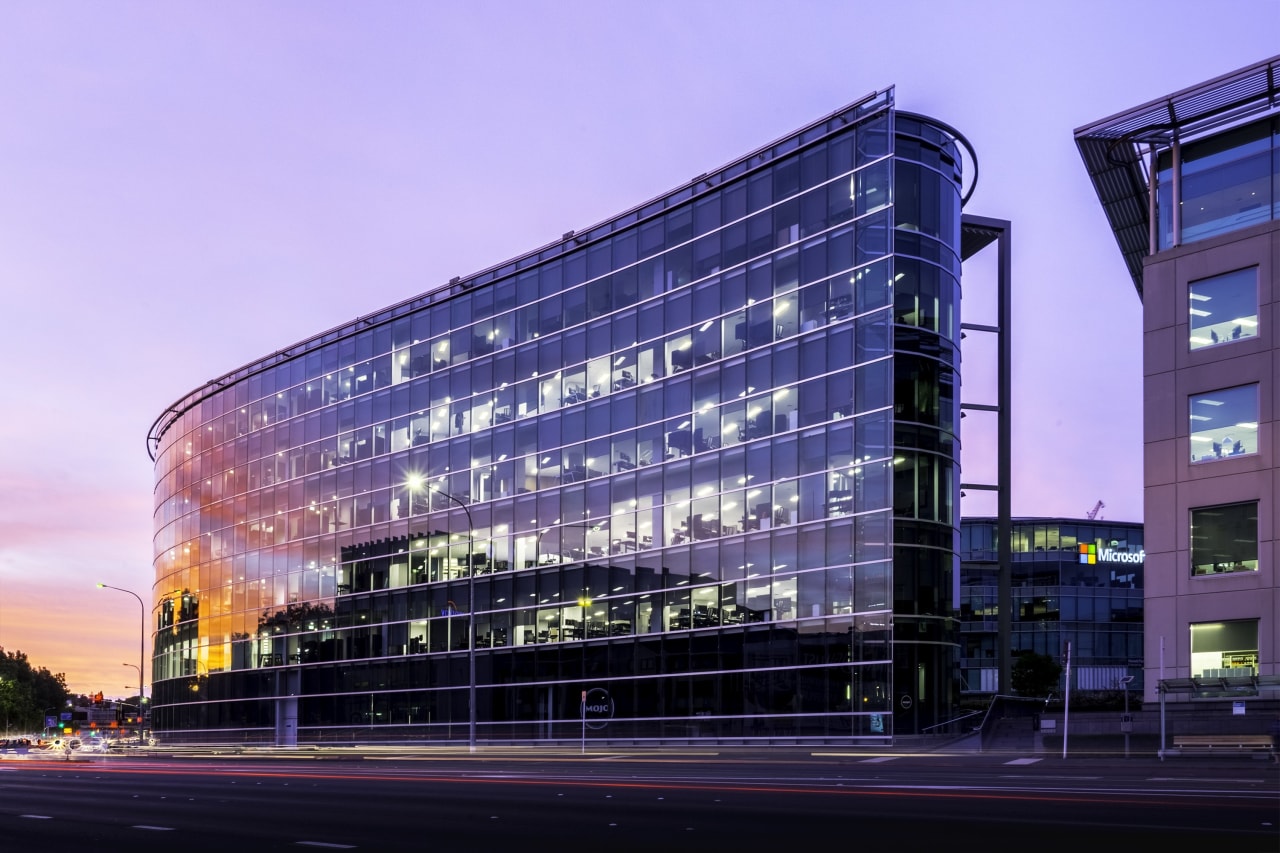 When Auckland Transport moved to the VXV20 building architecture, building, city, commercial building, condominium, corporate headquarters, daytime, facade, headquarters, landmark, metropolis, metropolitan area, mixed use, night, reflection, residential area, sky, structure, tower block, urban area, blue, purple