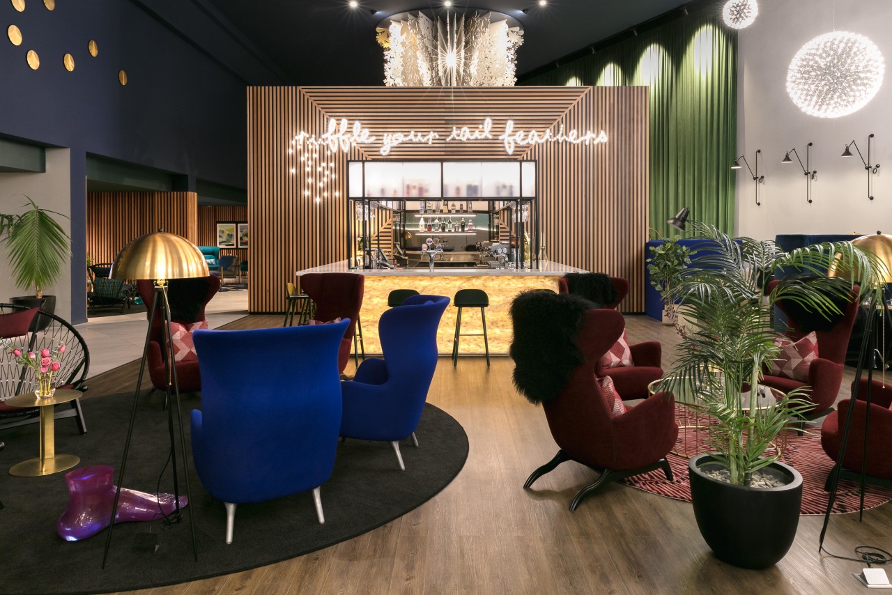 The back-lit onyx bar is set against the interior design, living room, lobby, room, black