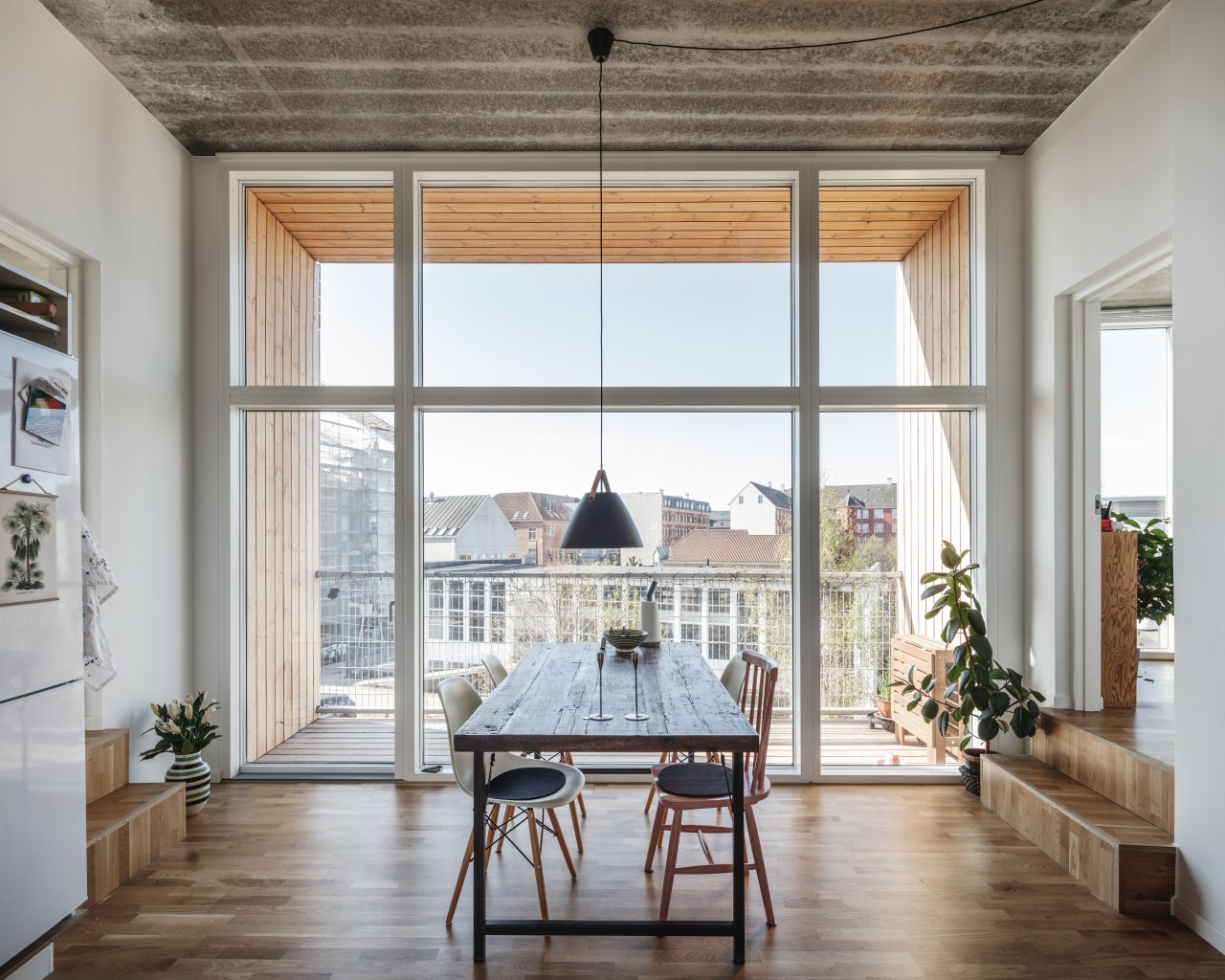 The stacking pattern of the modules used by dining room, floor, flooring, furniture, home, apartment, interior design, living room, table, Bjarke Ingels Group